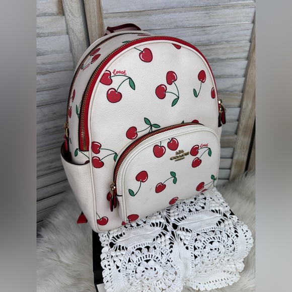 Coach Handbags - White Leather Coach Court Backpack Heart Cherry Print Limited Edition